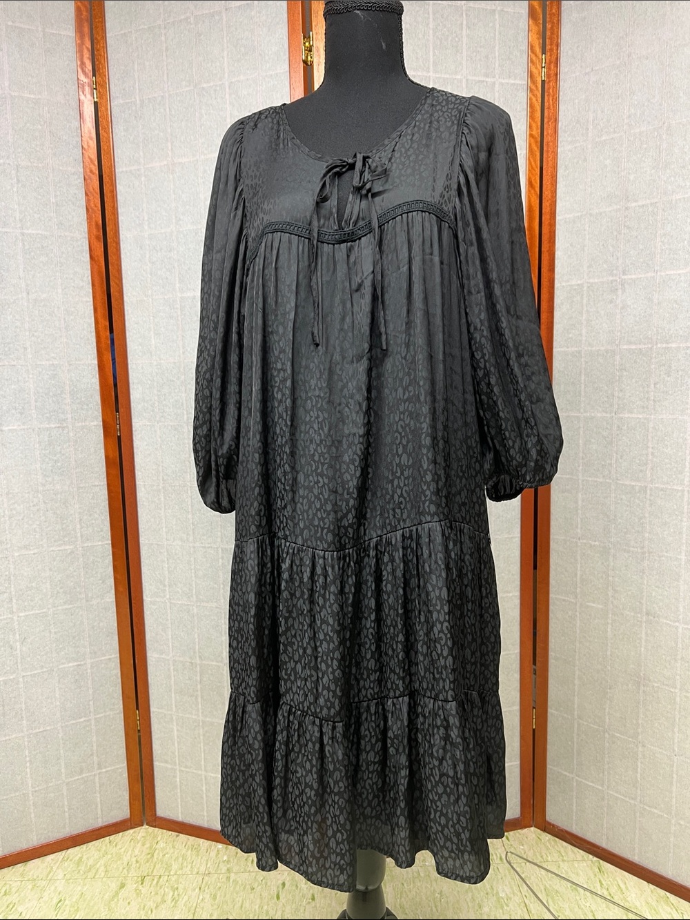 Black Tie-Neck Tiered Midi Dress with Subtle Animal Jacquard